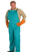 Man wearing Chicago Protective Apparel 618-GR Bib Overalls 8 oz Green Cotton